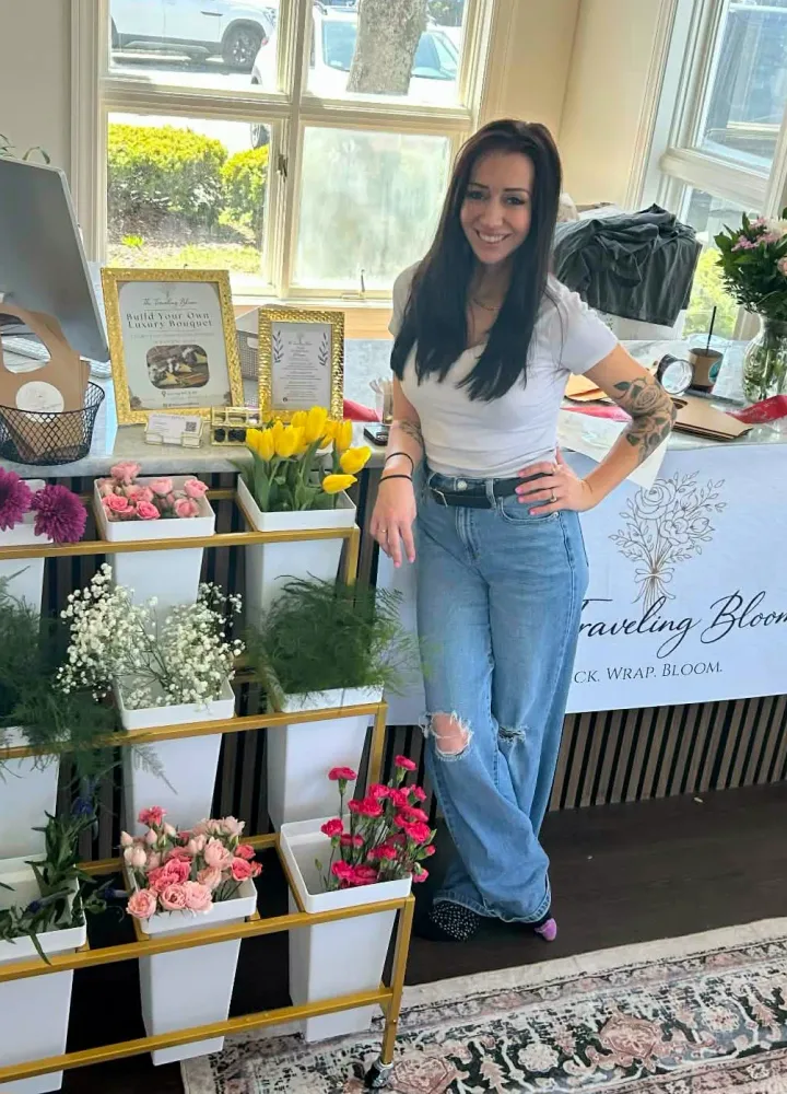 Alaina from The Traveling Bloom with the bloom cart at an event