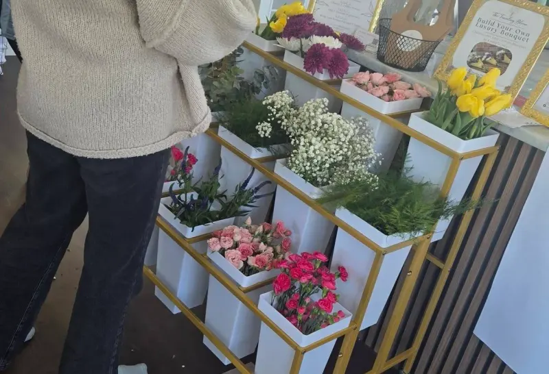 Bouquet bar flower setup at an event
